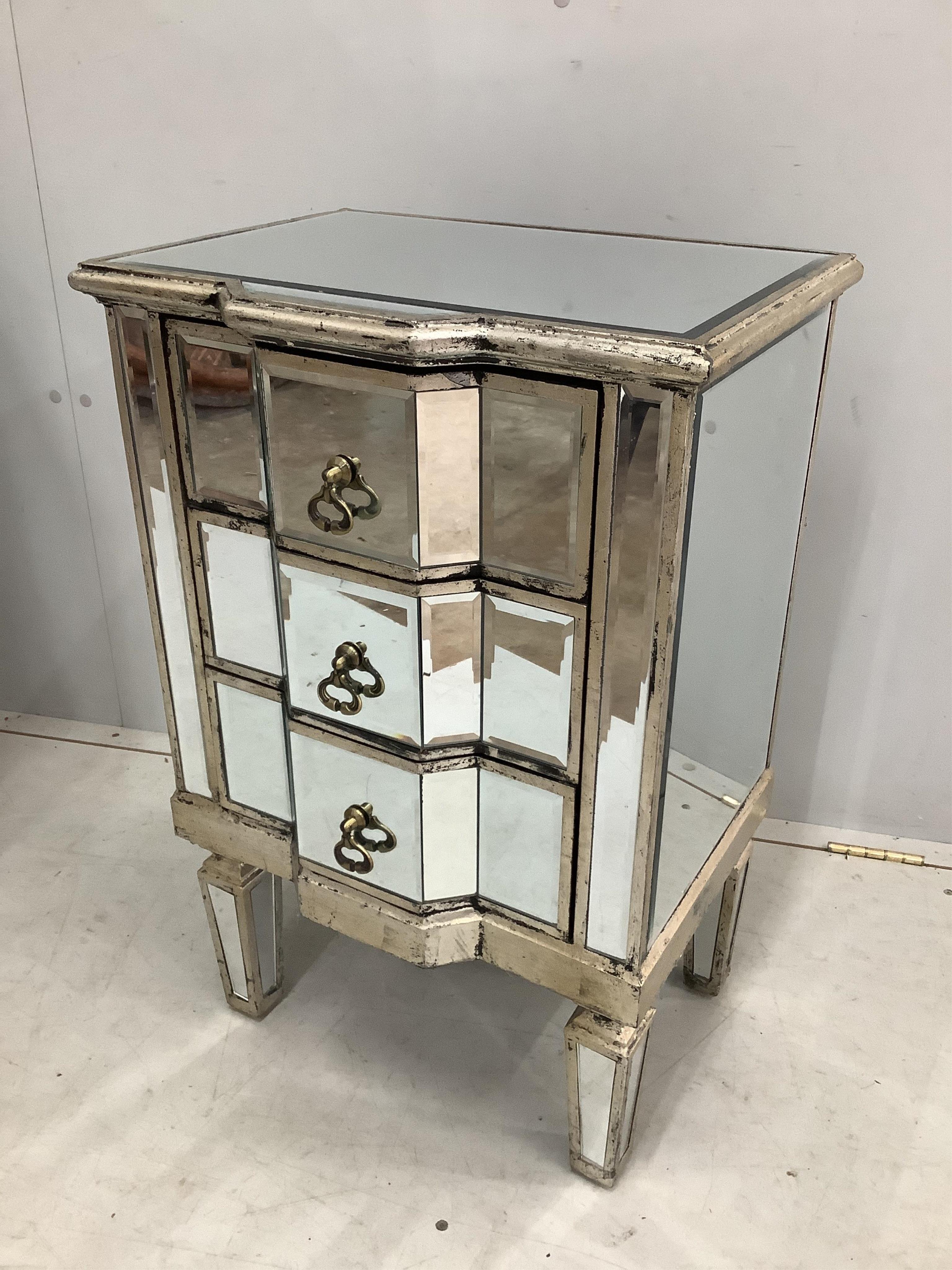 A pair of modern Venetian style mirrored three drawer bedside chests, width 47cm, height 72cm